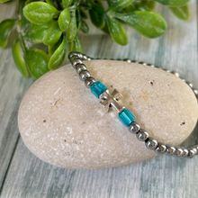 Load image into Gallery viewer, Silver Hematite Cross and Turquoise Bead Bracelet